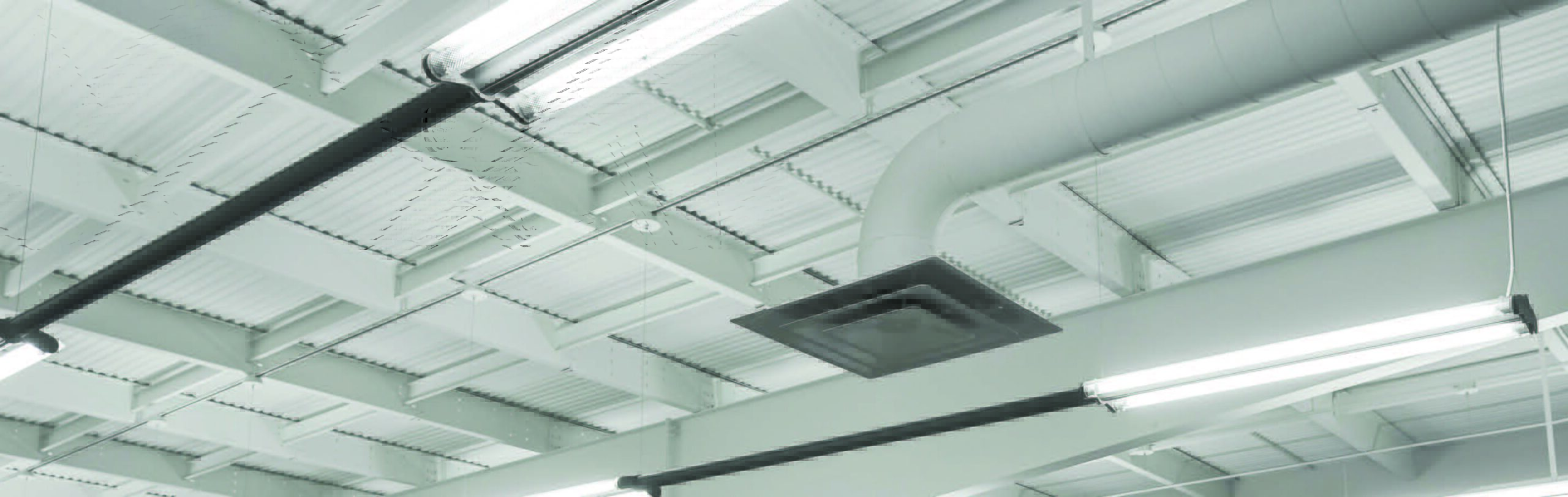 Butler Mod 36 interior metal wall liner panel installed on the inside of Butler wall girts creating a clean durable washable surface while protecting blanket insulation in a commercial metal building