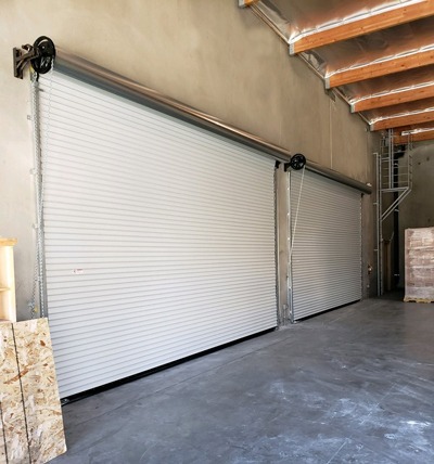 Butler Tereza Series 200 Original Sheet Door component detail — [drum assembly / weather seal / lock assembly / guide rail / chain operation / curtain section / full door view] (assign each to the appropriate detail based on order)