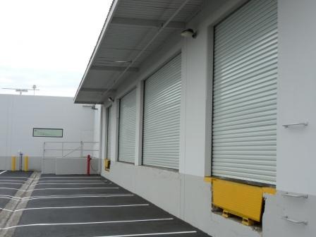 Butler Tereza Series 200 Original Sheet Door component detail — [drum assembly / weather seal / lock assembly / guide rail / chain operation / curtain section / full door view] (assign each to the appropriate detail based on order)