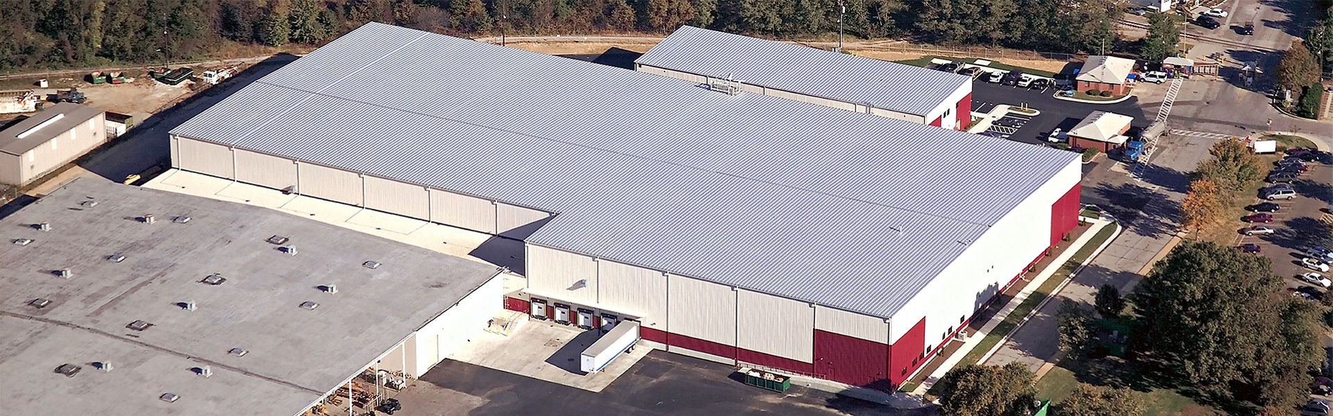 Butler Building trim and flashing components including base trim corner trim and eave trim installed on a commercial metal building providing weathertight panel transitions and a professionally finished exterior