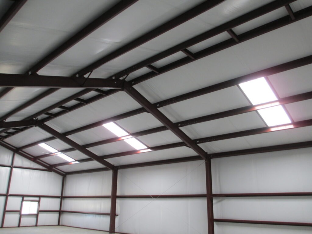 Butler Building skylight and light transmitting panel installed on metal building roof providing natural daylighting and energy efficient illumination