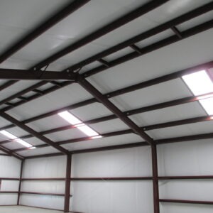 Butler Building skylight and light transmitting panel installed on metal building roof providing natural daylighting and energy efficient illumination