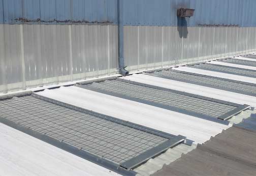 Butler Butlerib II light transmitting roof panel LTP white fiberglass form fitted to metal roof profile for natural daylighting in commercial buildings
