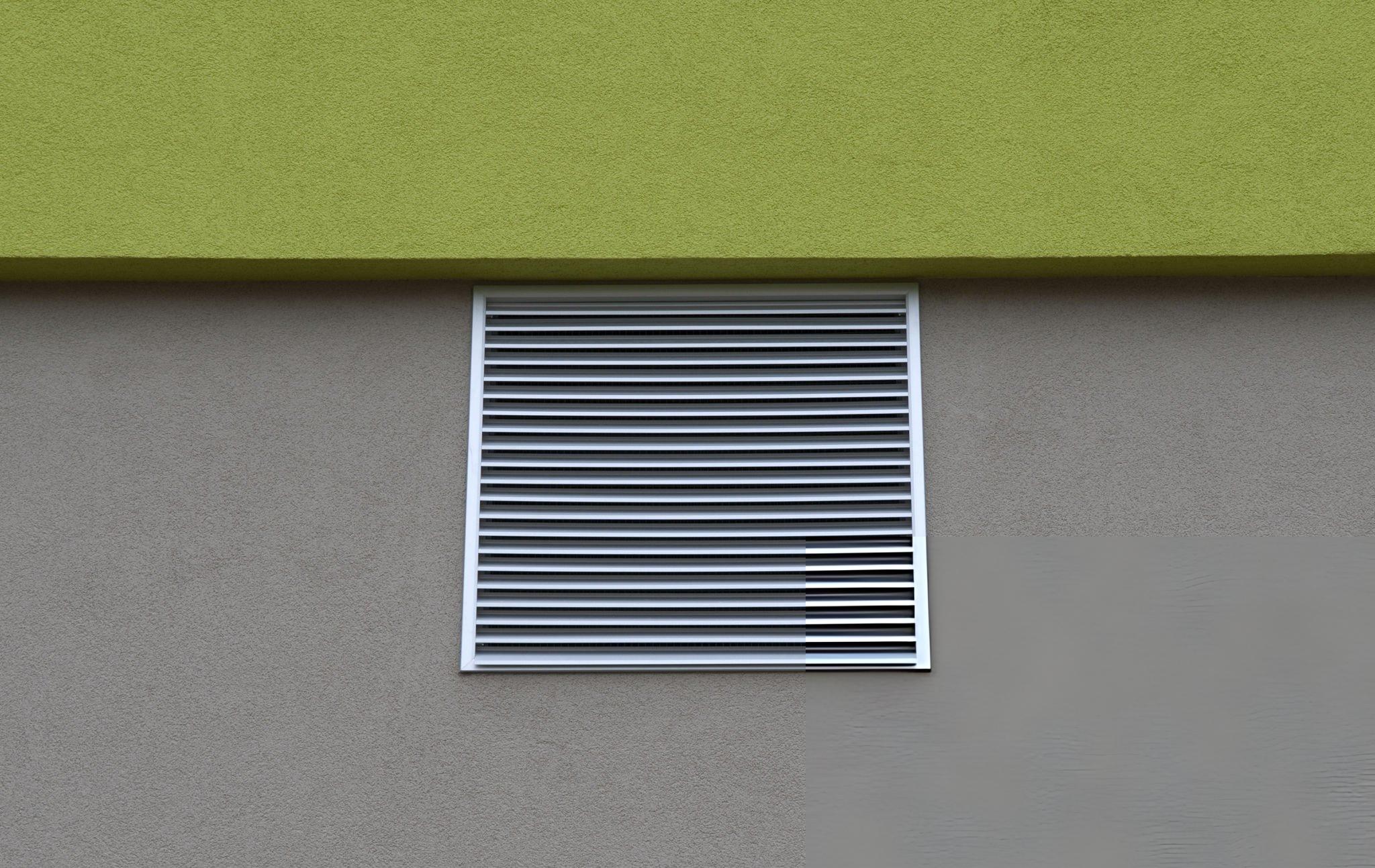 Butler adjustable wall louver installed in a Butler Butlerib II or Shadowall metal wall panel showing self-flashing frame integration and airflow management configuration for commercial and industrial building ventilation