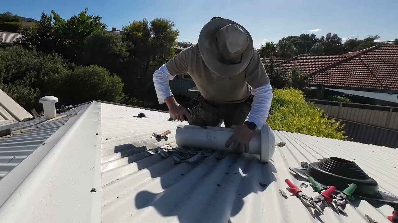 Multiple pipe and conduit penetrations on a Butler metal roof showing the risk of water intrusion without proper Dektite or Roofjack flashing seals