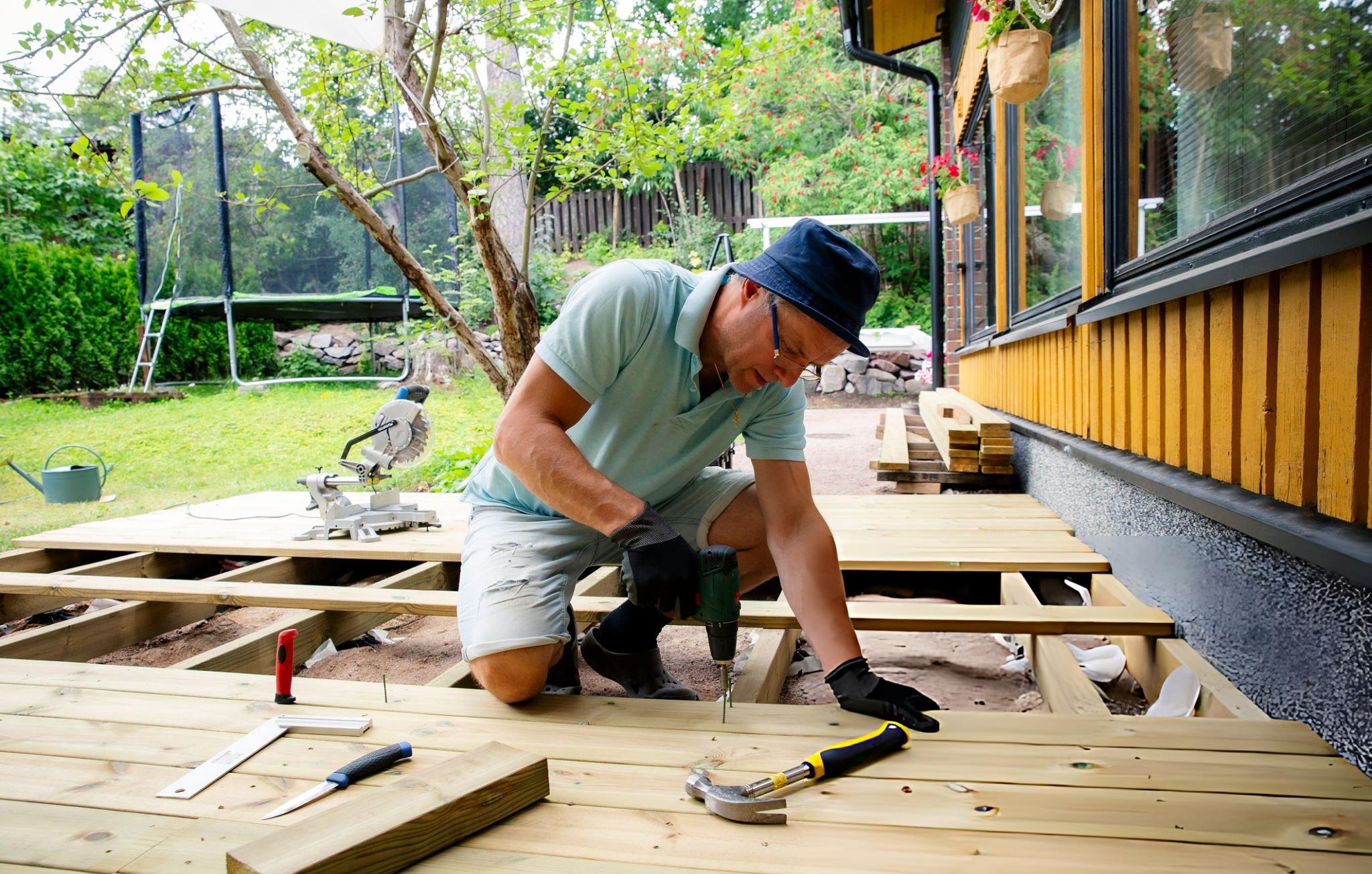 Crew assembling a DIY steel building kit